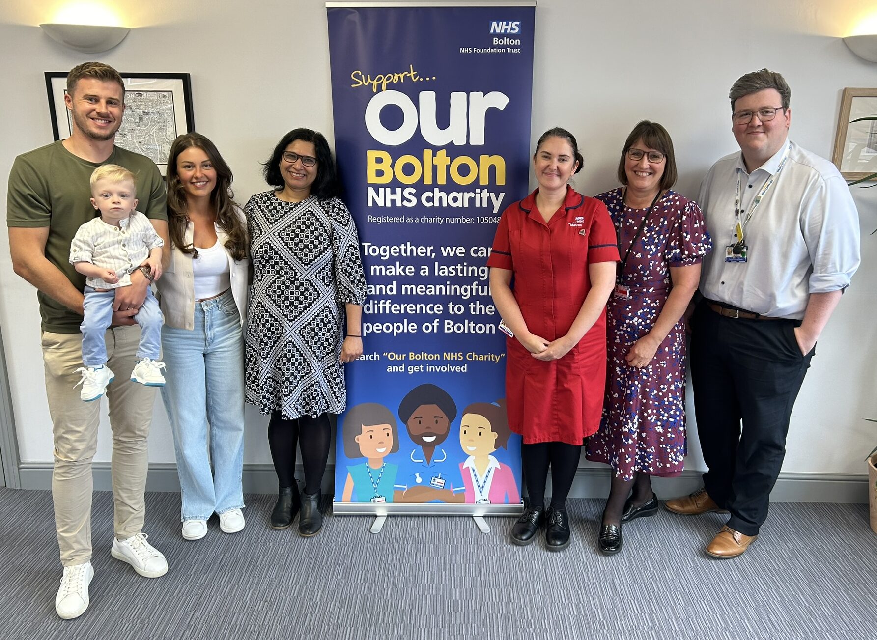 Chloe, James and Jude with hospital staff